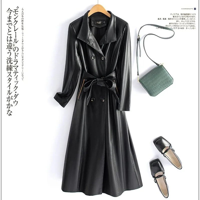 Trench da donna in pelle di pecora Autunno Inverno Moda Colletto alla coreana Doppio petto Cappotto lungo in pelle sottile con lacci Pelle divisa