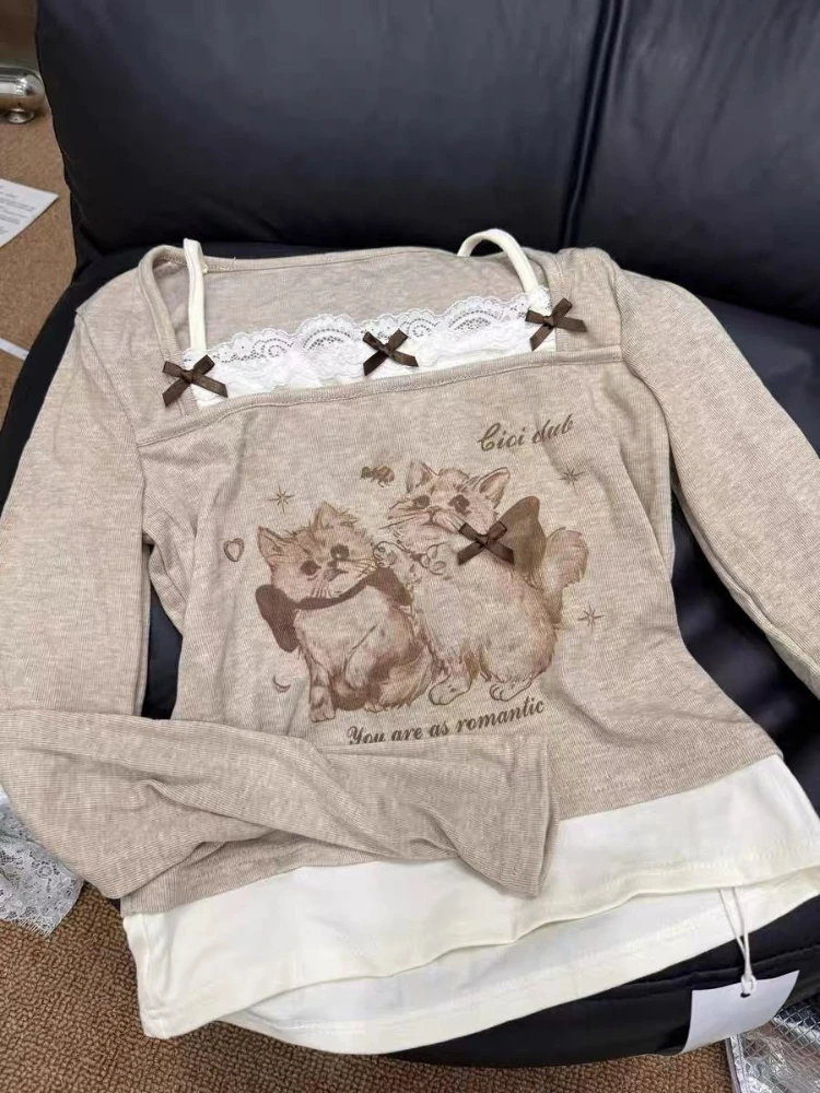 Camisetas Vintage americanas de manga larga para mujer, Top informal con estampado de dibujos animados de gato, Top falso de dos piezas Y2k Retro de retazos con lazo de encaje coreano 2025