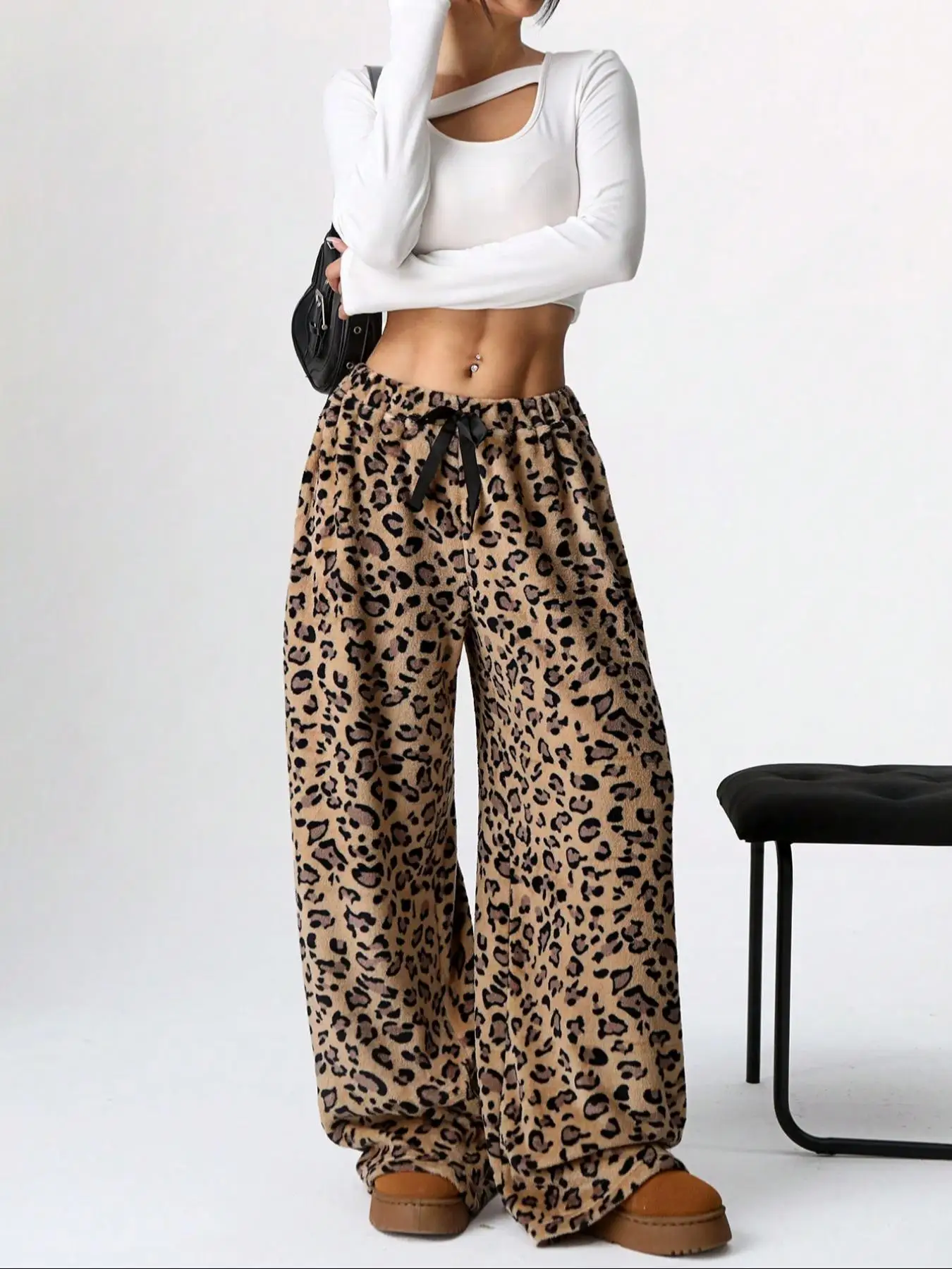 Pantalones de pierna ancha informales cómodos y sueltos con cordón en la cintura con estampado de leopardo a la moda para otoño e invierno de talla grande para mujer