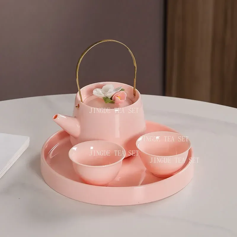 

Handcrafted Pink Flower Tea Set High Appearance Lovely Ceramic Teapot and Cup Set Customized Ball Hole Filter Tea Infuser