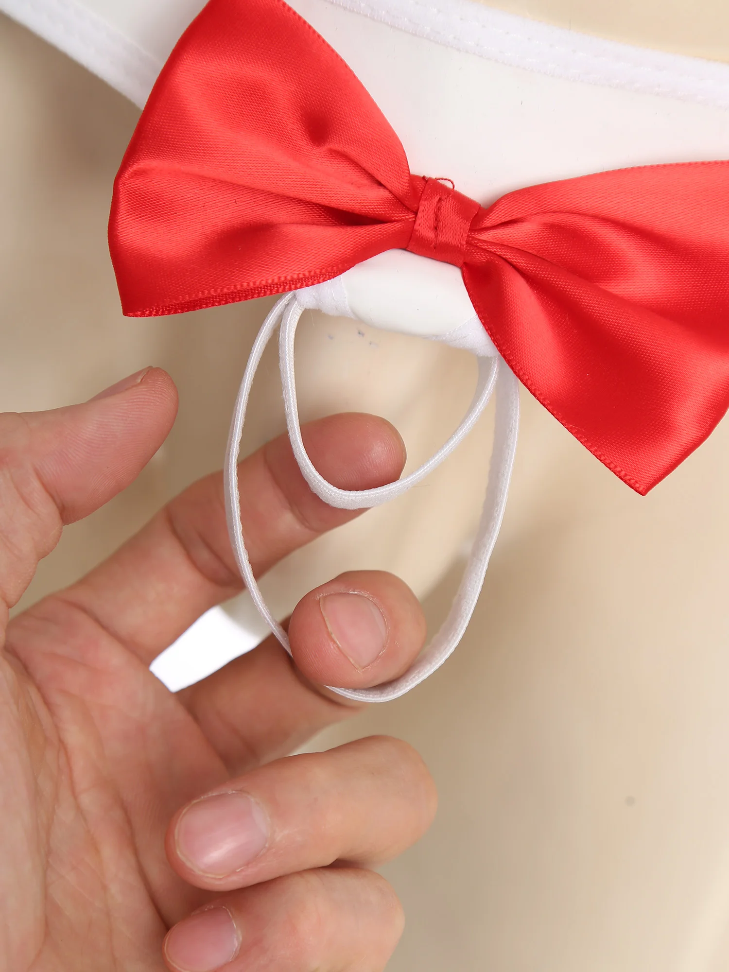 

Мужское забавное рождественское нижнее белье, подарки-кляп, декор с бантом/помпоном, микро-стринги с низкой посадкой, уплотнительные кольца, мини-стринги, трусы, нижнее белье