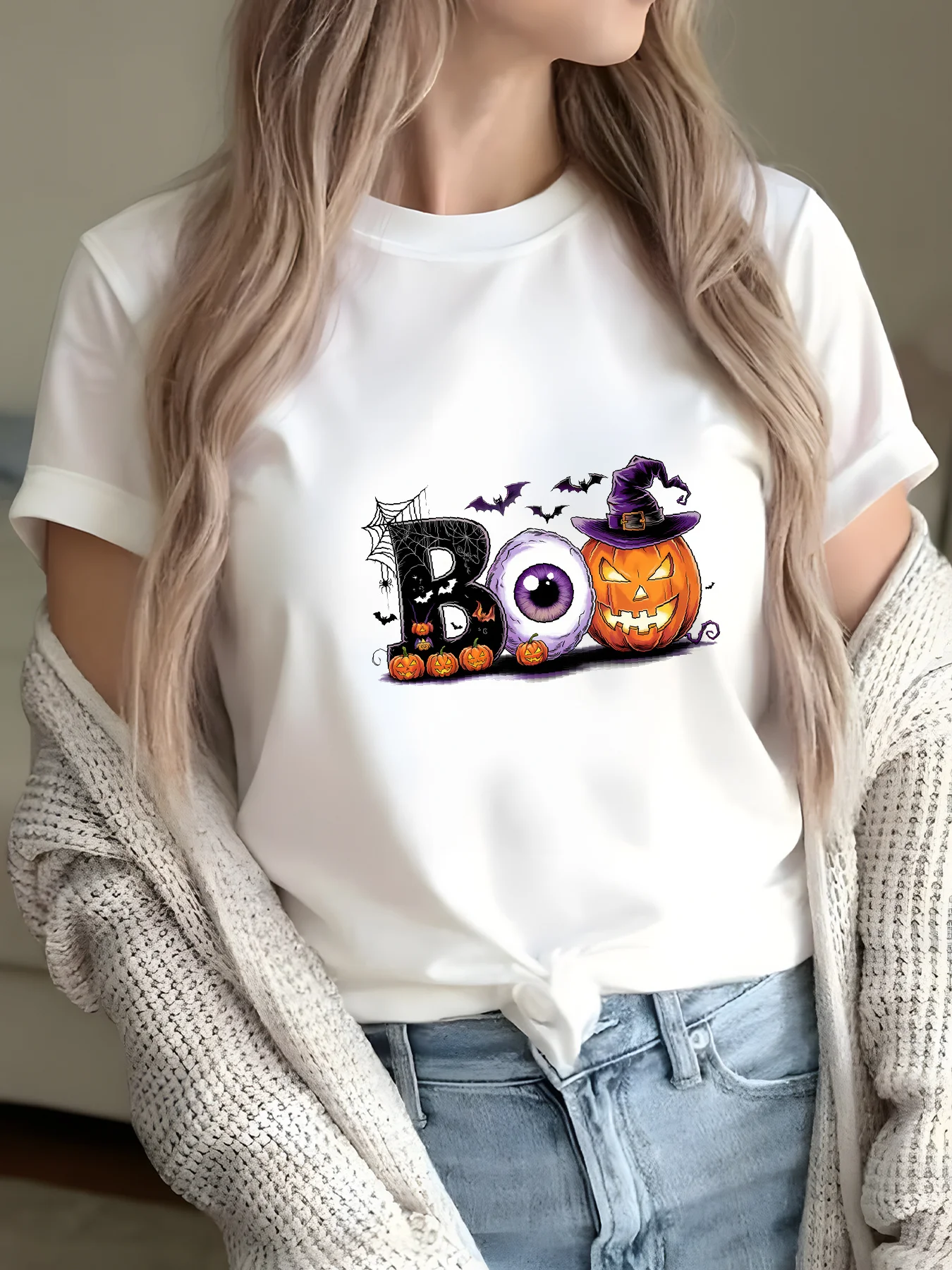 

Spooky Halloween BOO Lettering with Glowing Eyes Bats Jack-O-Lantern Print Costume Playful Pumpkin Bat Graphics