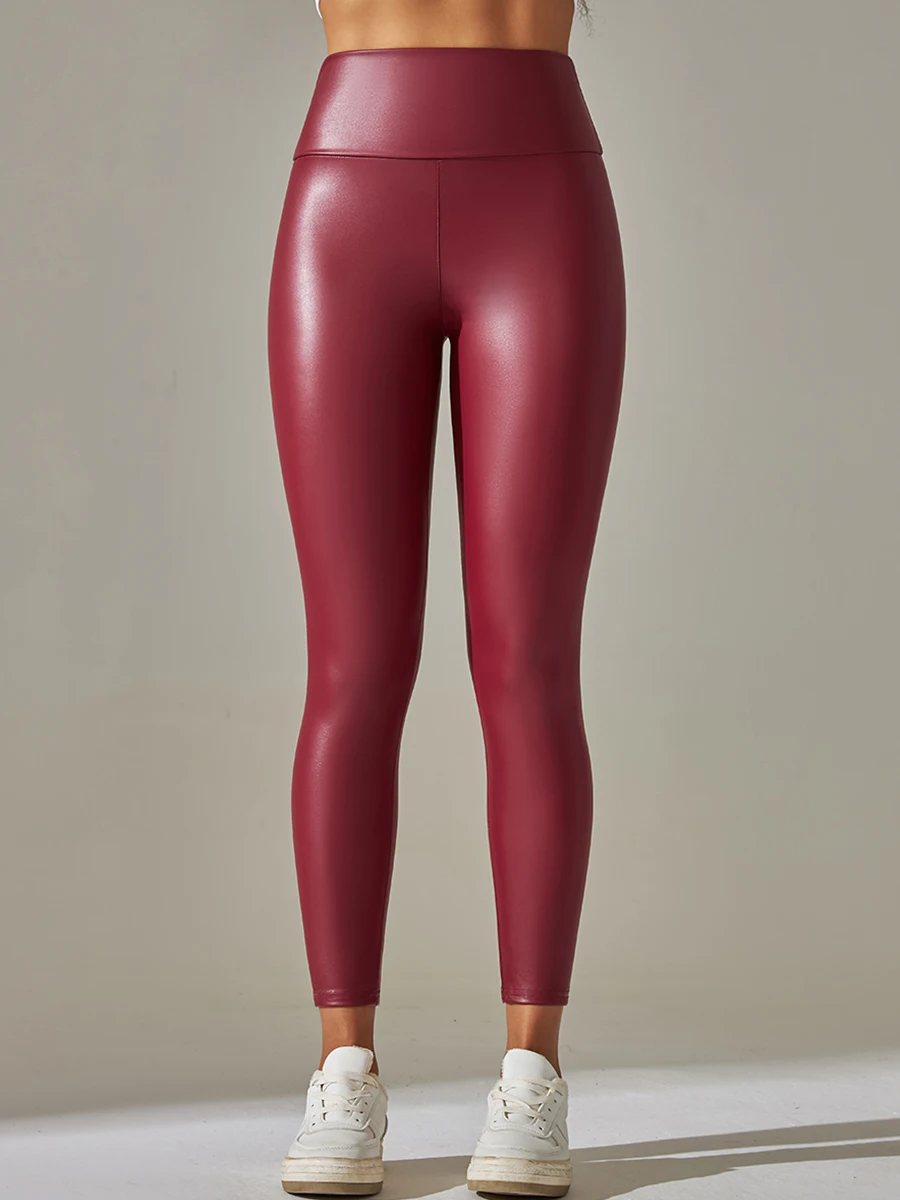 Women leggings solid color stitching leather pants elastic tightness tight waist nine -point casual trousers female