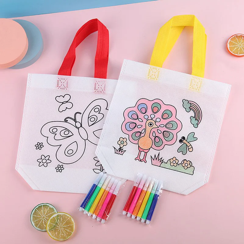 ของเล่นเด็ก ชุดระบายสี DIY กระเป๋ากราฟฟิตีและปากกาสี  กระเป๋าของขวัญผ้าไม่ทอ งานฝีมือ กระเป๋าระบายสีหลากสี รุ่น TMZ