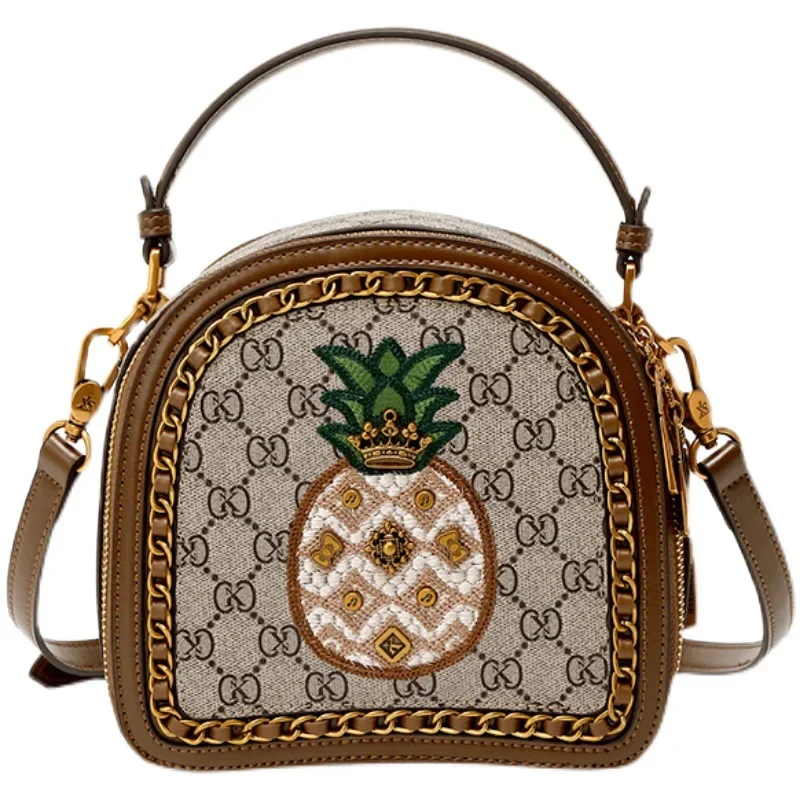 Fashion brand hand embroidered oval hand-held women's bag high-end versatile crossbody European and American shoulder bag