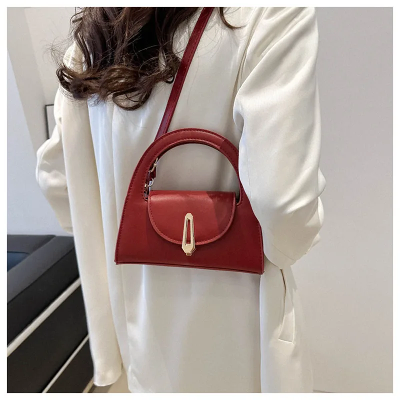 Borsa a mano con manico circolare di design bordeaux 2024 borsa a tracolla con serratura unica delle nuove donne moda Versatile borse ascellari per