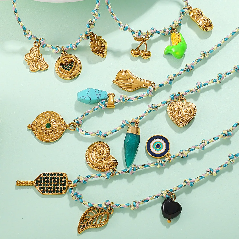 

Creative Multi-Element Pendant & Vibrant Animal-Fruit Bracelet – Stainless Steel Design