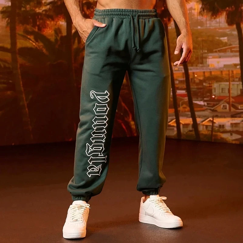 New style  Men Sweatpants Spring Autumn Leisure walk Sports Fashion brand Fitness Cotton Printed Pants Mid Waist  Body shaping