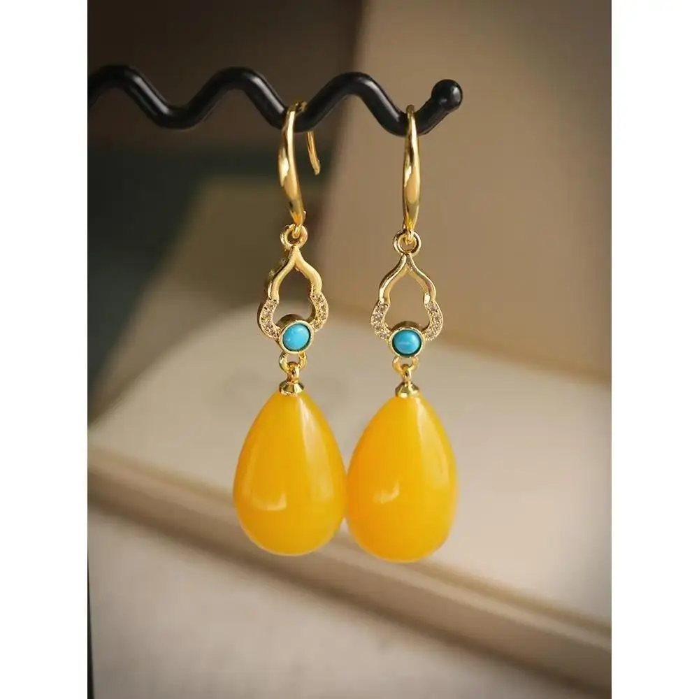 

Classic Hot Sale Amber Beeswax Waterdrop Earrings Inlaid with Fashionable and Versatile Niche Design Earrings Exquisite Gifts