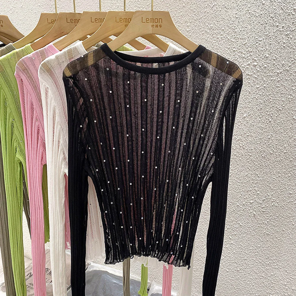 ニットセーター女性プルオーバー新しい長袖 O ネック中空ニットセータープルオーバー女性トップスセーター女性服 Q1267