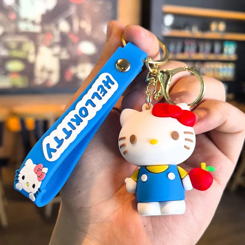 クリエイティブな韓国のかわいい漫画ハローキティシリーズキーホルダーペンダントPVCドールカーキーホルダーペンダントカップルバックパックキーホルダーペンダント