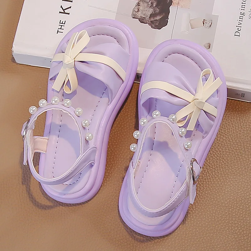 

2026 New Summer Toddler Bowknot Beach Shoes Princess Girls Leather Sandals with Beaded Strap Soft Sole Classic Elegant Party