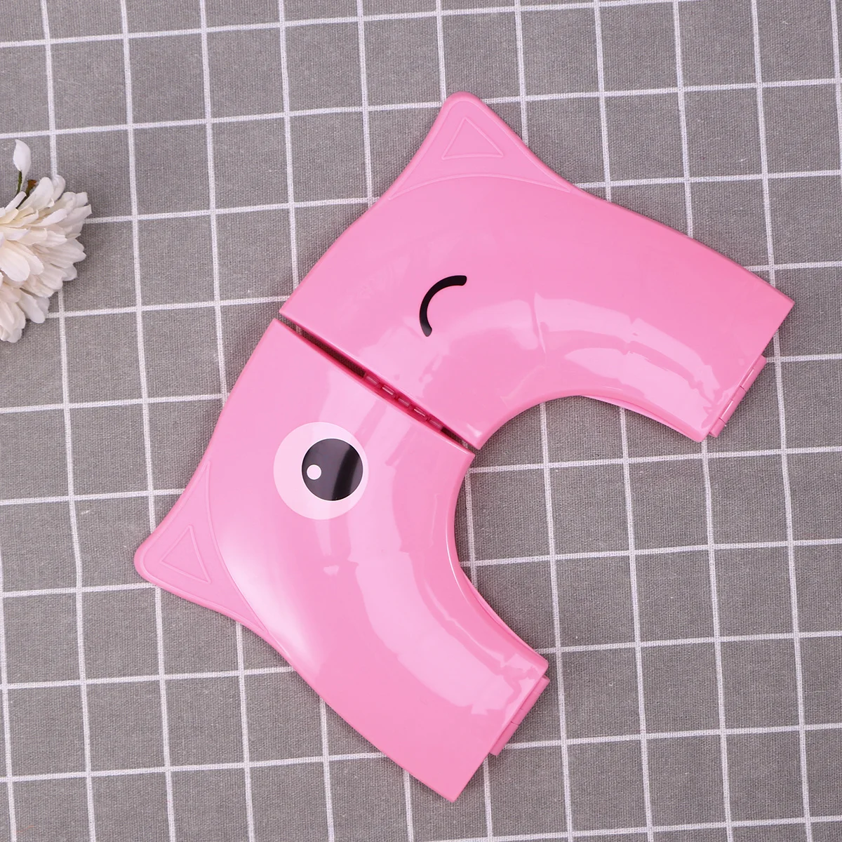 Składane, lekkie i przenośne nakładki na sedes do użytku w podróży, w domu, zimowe, dla dzieci, z motywem małych oczek, różowe.