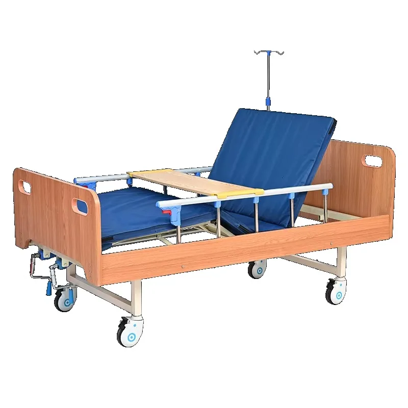 Manual two-rocker hospital bed with wooden headboard, aluminum frame, backrest and leg rest functions, suitable for home and ho