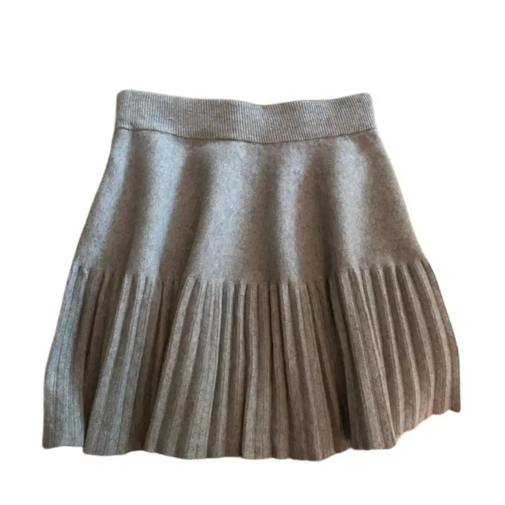 

Модные плиссированные дизайнерские плиссированные мини-юбки трапециевидной формы, однотонные корейские милые юбки, эластичные вязаные трикотажные юбки, повседневная одежда