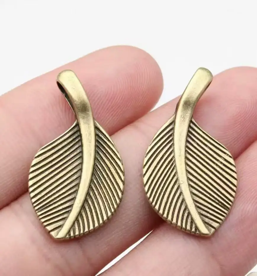 15 szt. zawieszek ze stopu cynku o wymiarach 25*15 mm z motywem liści do ręcznie robionych akcesoriów HW3227