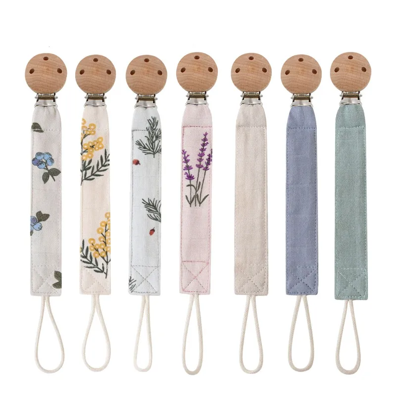 

New Cotton Linen Baby Pacifier Clips Floral Printed Dummy Nipple Holder Three Holes Wooden Soother Clip Strap Pacifier Chain