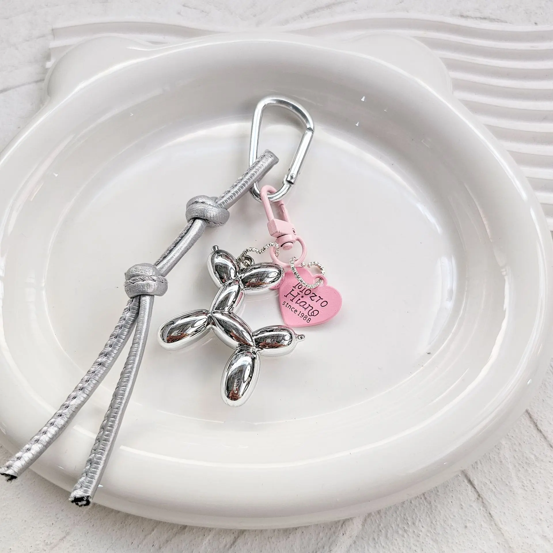 

Leather woven rope balloon dog bag pendant, Korean niche keychain