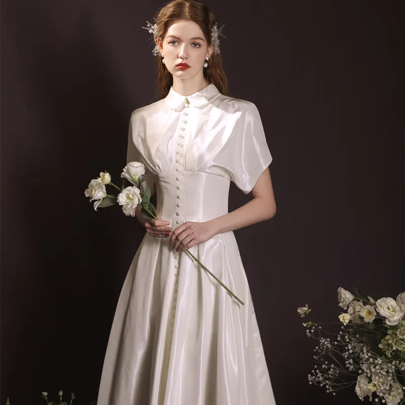 نمط جديد شهادة الزفاف الفن امتحان العشاء السنوي ريترو أنيق فستان أبيض قصير للنساء