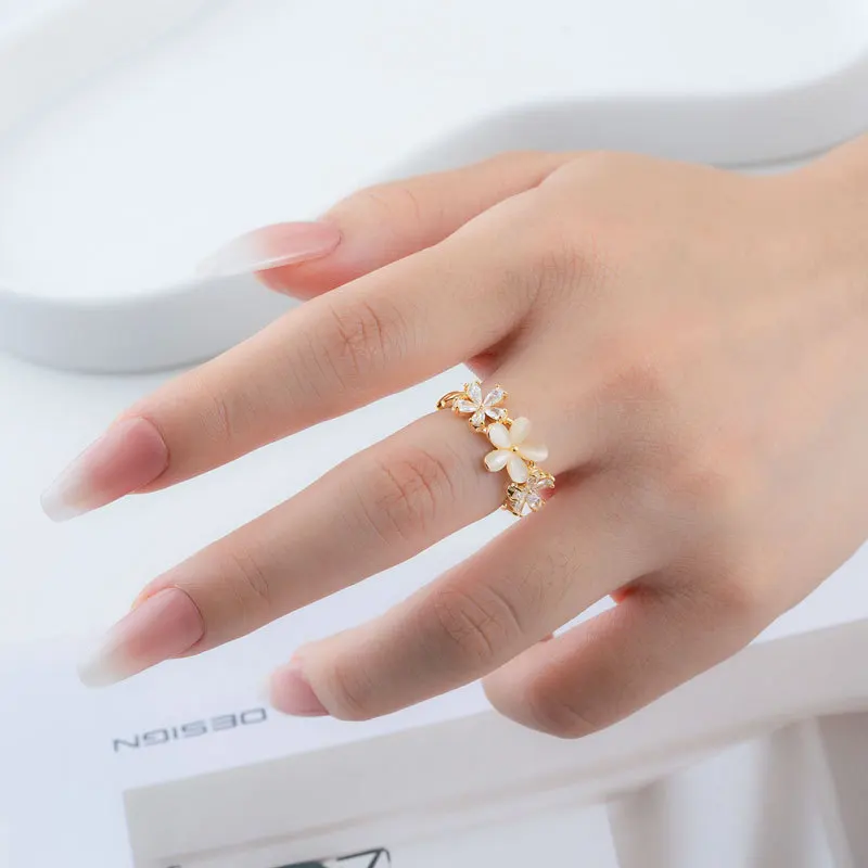 Fashionable three-dimensional flower opening ring with adjustable ring loop