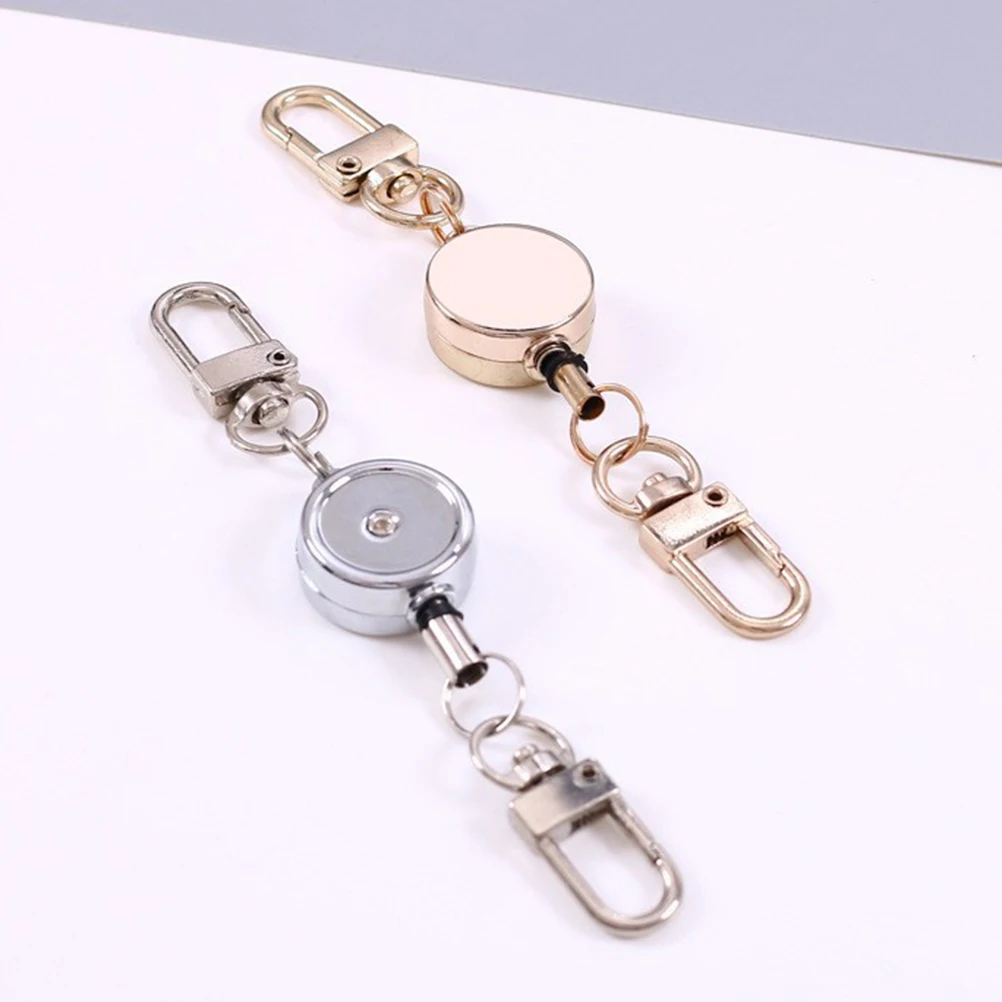 Llavero retráctil antirrobo, soporte para insignia, carrete de identificación estirable de alta resistencia para deportes de acampada al aire libre, 2 uds.