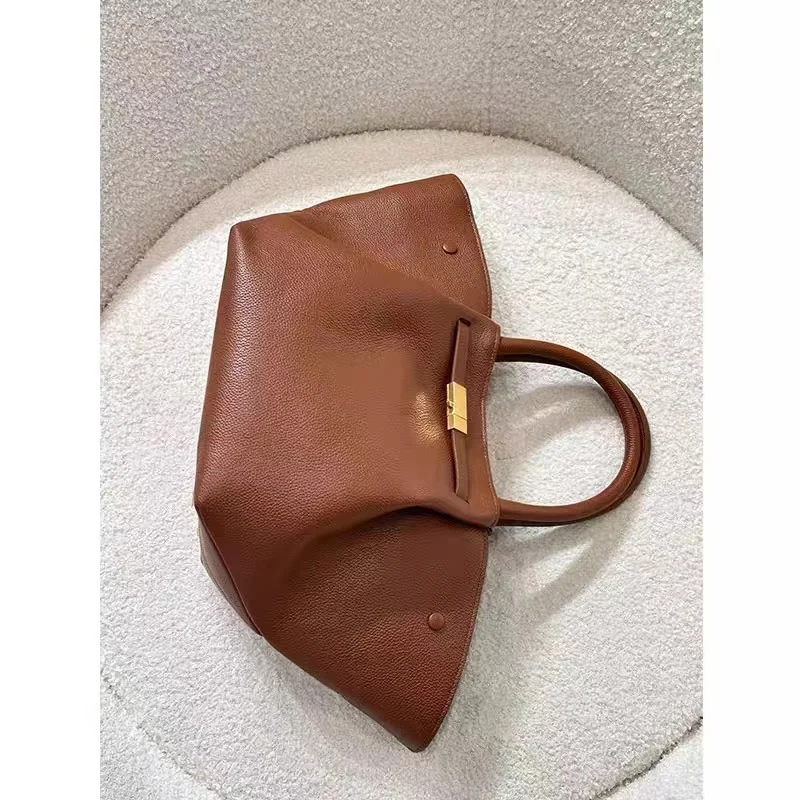 Bolso de mano de cuero de gran capacidad para mujer, bolso de mano de ala tipo murciélago, Simple, de ocio, de alta calidad, a la moda, Europa y Estados Unidos, nuevo