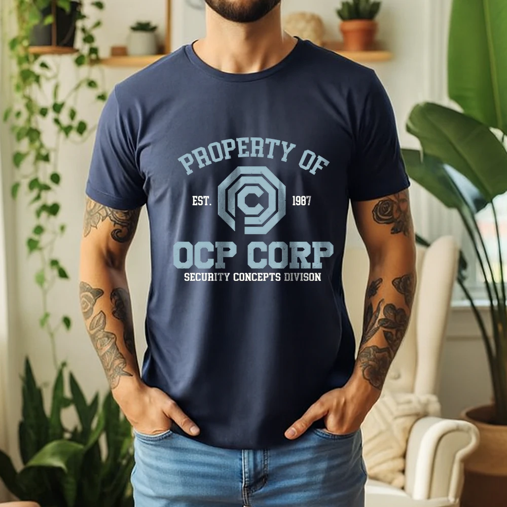 Camiseta Oversized Gráfica OCP CORP 100% Algodão Verão 2026 - Tema Retrô RoboCop Sci-Fi 1987 Manga Curta