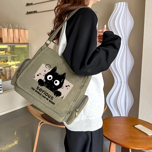 Imagen 2 del producto Interesante bolso de hombro con dibujos animados para mujer, bolso de lona de gran capacidad para estudiantes, bolsa de libros