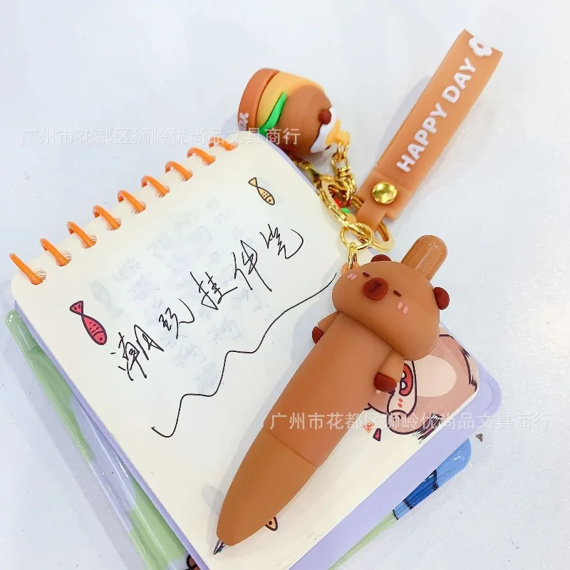 

2Pcs/Set Capybara Doll pendant Gel Pen 0.5mm Black ink Kawaii Cartoon Press Pen Neutral Pen School Writing Supplies