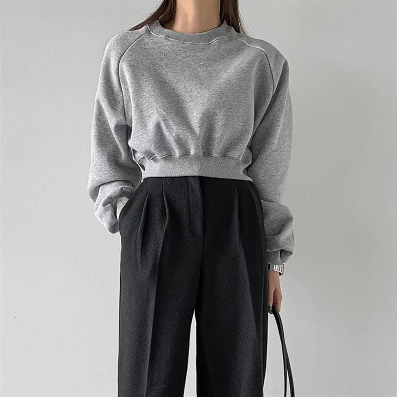 

2025 Spring and Autumn New Korean Fashion Chic Solid Color Slimming Top Round Neck Waist-Cinching High-Waisted Short Sweatshirt