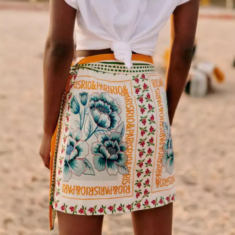 Falda corta de verano con estampado floral, de encaje, informal, a la moda, estilo urbano, línea A, de poliéster, para mujer.