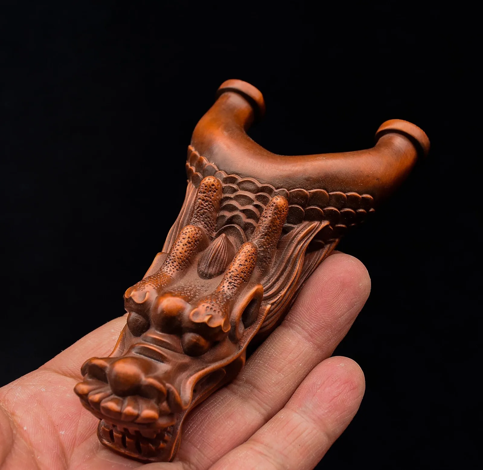 

Huangyang wood carving carved dragon head slingshot