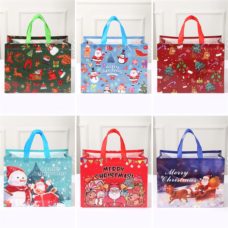 4 Uds. Bolsa de regalo de mano con estampado de muñeco de nieve de Papá Noel de Navidad de dibujos animados, exquisita serie navideña, bolsas de mano no tejidas