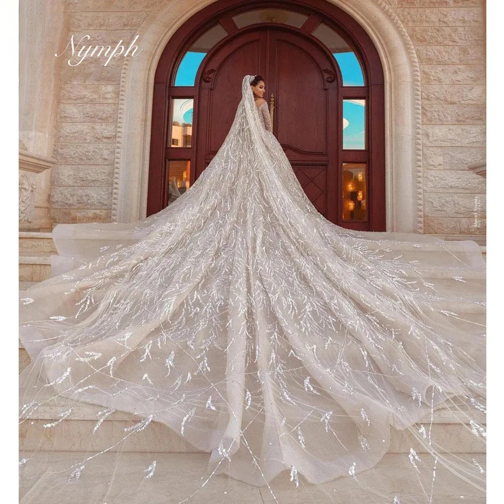 Customized Ball Gown V Neck Arabia Wedding Dresses Sparkly Glitter Long Sleeve Sequin Beaded Evening Bridal Gowns Sweep Train