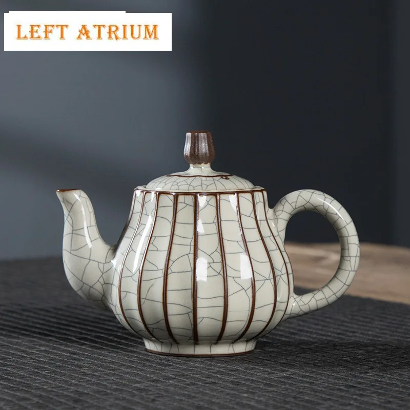 

Longquan Ru Kiln Celadon Teapot Handmade Ice Cracked Glaze Pot Tea Maker Kettle with Filter Tea Services Accessories Collection