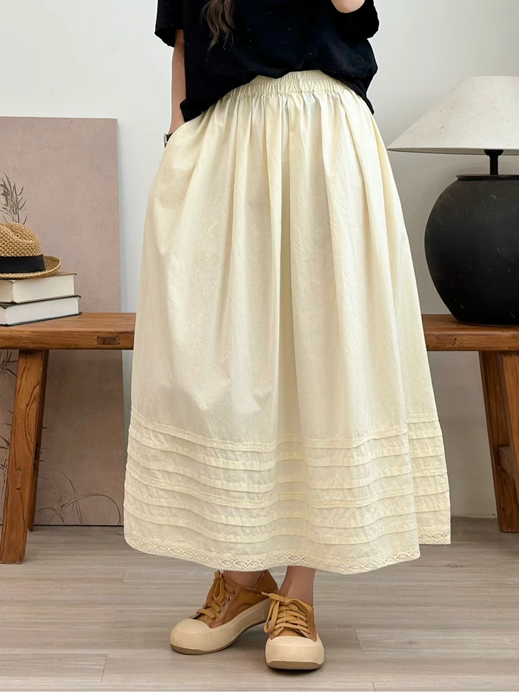 レトロな芸術的な純綿レーストリムスプライシングミディスカート女性の夏の新しいSle Ele中空花柄fボディスカート