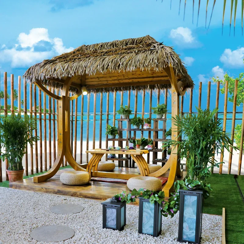 

'A classical style thatched roof swing pavilion with a built-in mat for rest