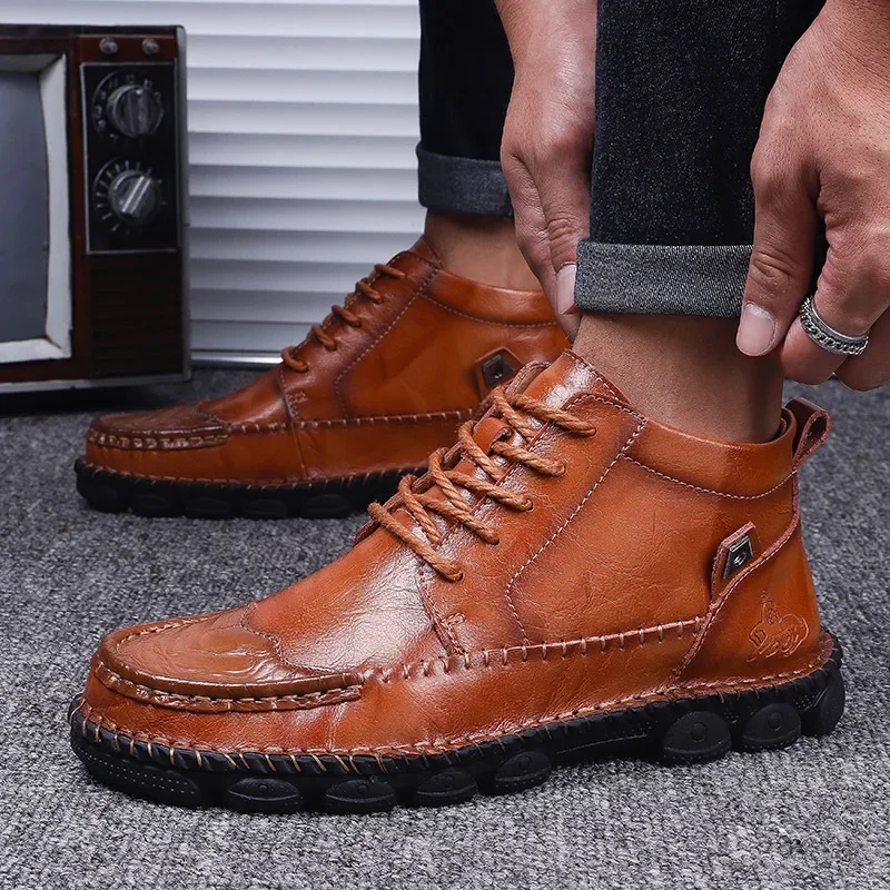 أزياء الخريف والشتاء بالإضافة إلى حجم أحذية قصيرة للرجال من الجلد الطبيعي مقاس أكبر أحذية العمل البريطانية أحذية الكاحل العصرية للرجال