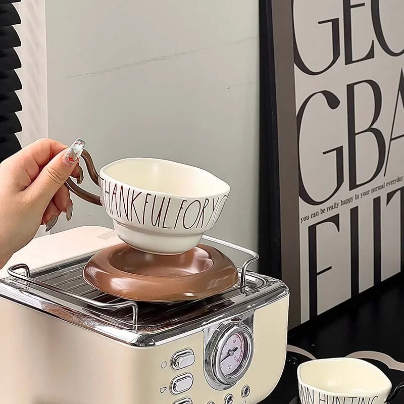 Light luxury simple ceramic coffee cup creative design sense letter saucer comfortable grip couple water