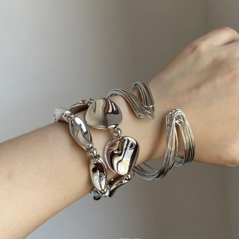 Gold-Plated Bangle Bracelet Set Variety Including Oval Drop - Shaped And Twisted Wire Designs Trendy Stackable Jewelry For Women