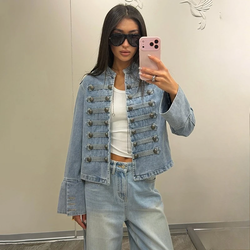 Original light blue jacket open over a white crop top