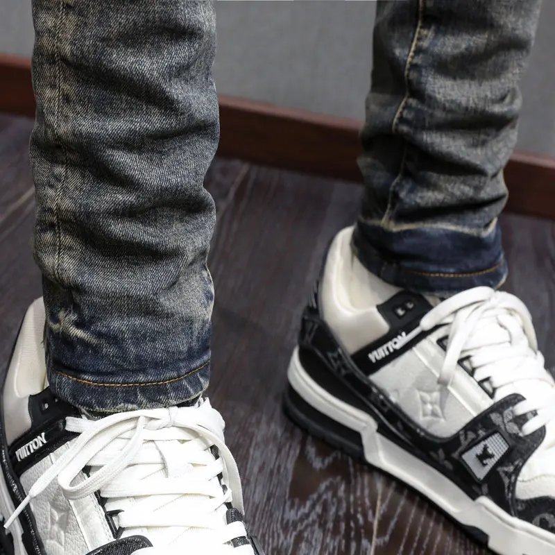 

Y2k fashion new men's jeans new stretch slim fit perforated black leather patch washed deep blue jeans designer high street hip-