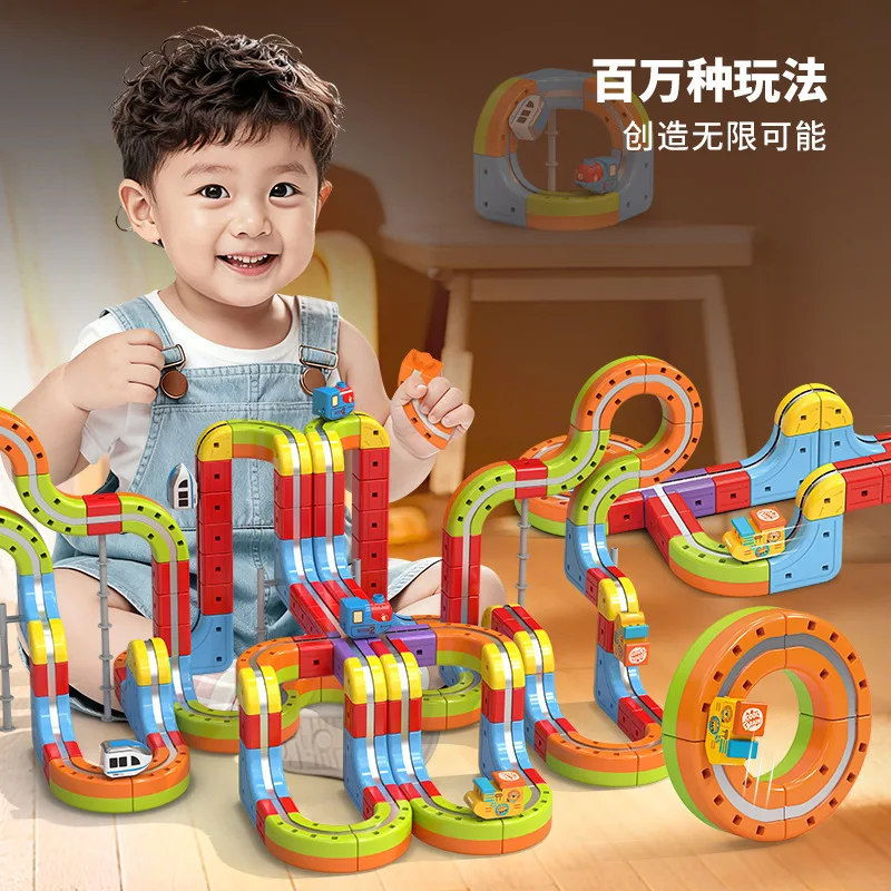 Różnorodne magiczne torowe kostki konstrukcyjne, magnetyczne klocki, kolejnik elektryczny, antygrawitacyjny, magnetyczny pociąg szybki.