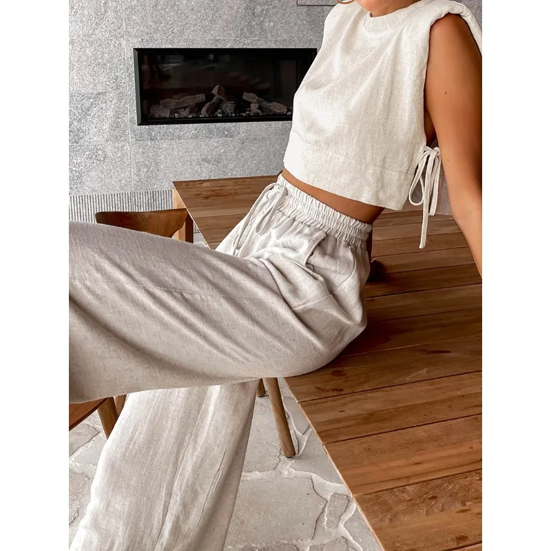 موضة القطن والكتان دعوى الملابس النسائية 2026 الربيع والصيف منصات الكتف الجديدة بلا أكمام بنطلون علوي قطعتين مجموعة