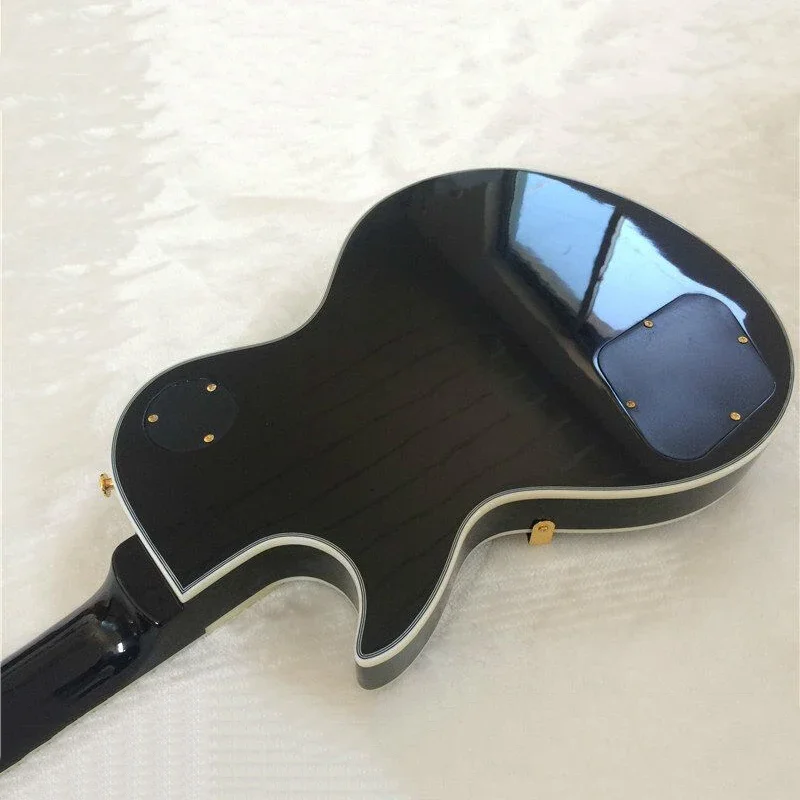 One piece LP black electric guitar with guaranteed quality and great feel, instrument can be customized