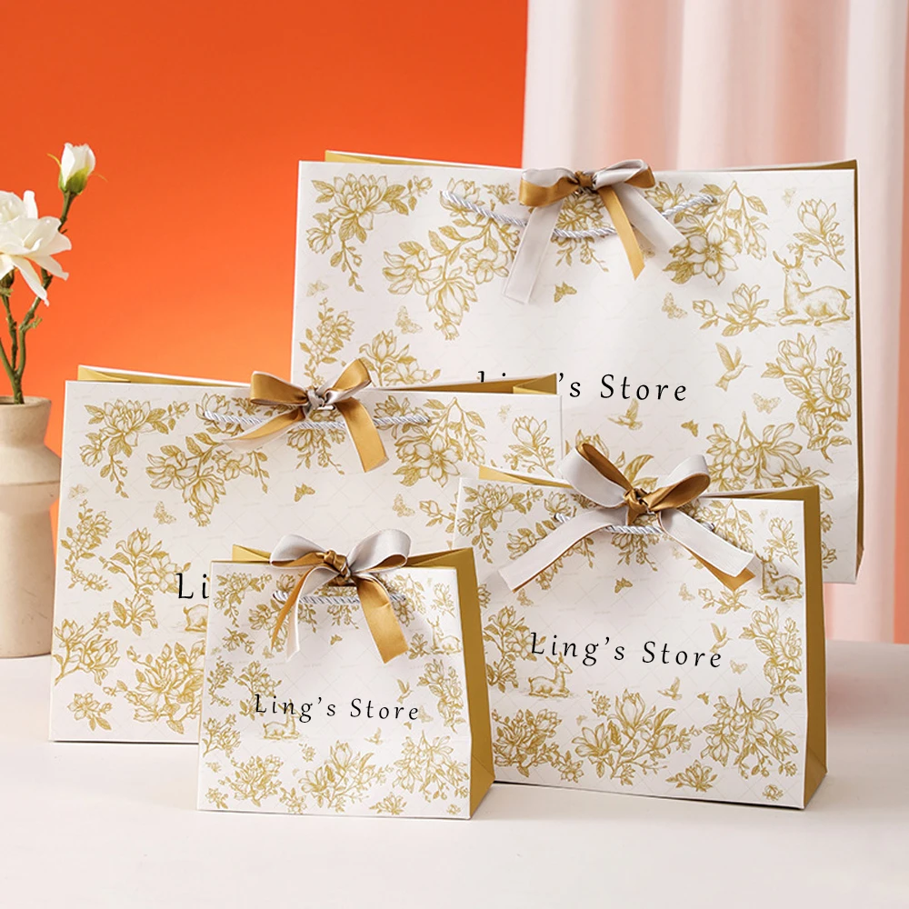 

50Pcs Personalized Logo Jewelry Paper Tote Bag Flower Cardboard Handle Pouch Baby Cloth Gift Shopping Pouches Boutique Organizer
