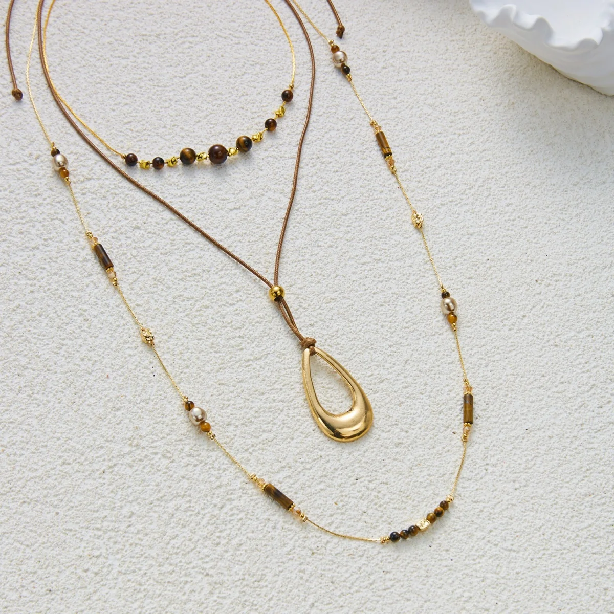 Vintage Maillard Halskette mit natürlichen Tigeraugen-Perlen, Sonnen- und ovalen Anhängern, für Damen und Herren, im ethnischen Stil, mit Blumen- und Kristallmotiven, lange Choker-Kette. – Detail 20