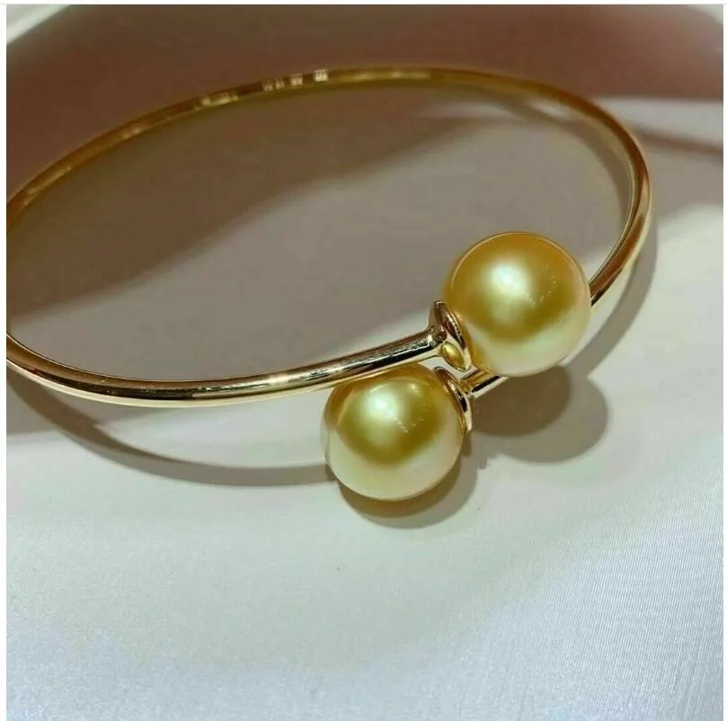 

Gorgeous AAAAA Giant 11-12mm Round South China Sea Gold Pearl Bracelet 925s-