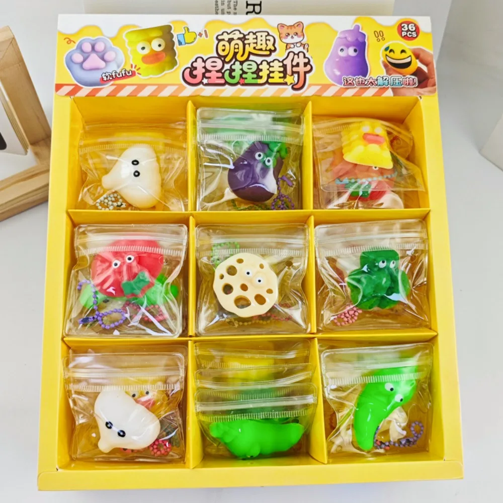 いたずら用ソフトキュートミニ餃子スクイーズフードシェイプスクイーズクリスタルバンピンチキーホルダーフィジェット感覚玩具