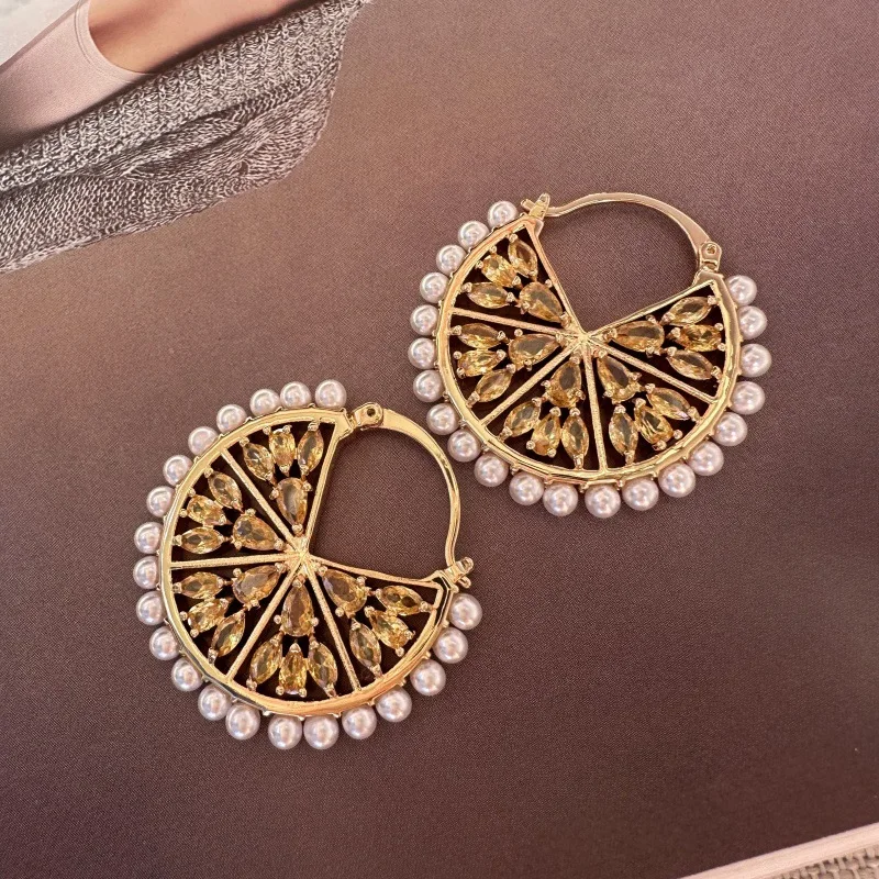 

Fashion fall and winter new circle hollow rhinestone inlaid lemon flower earrings earrings earrings female